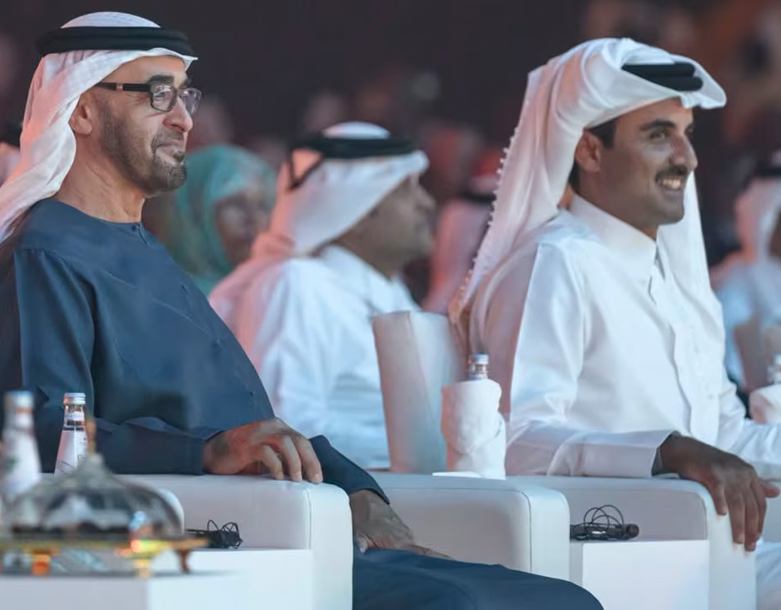 A video of the Emir of Qatar laughing after a whisper in his ear from Mohammed bin Zayed sparks a reaction